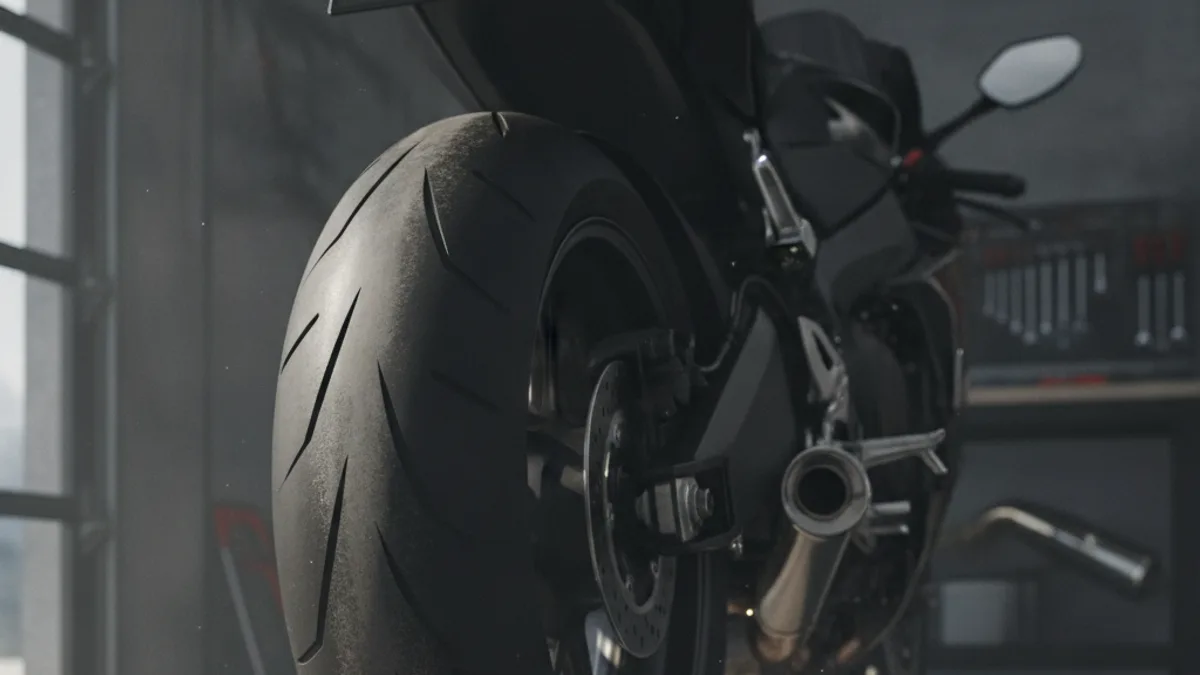 Blindagem de pneu de moto com selante antifuro TEX aplicado pela válvula
