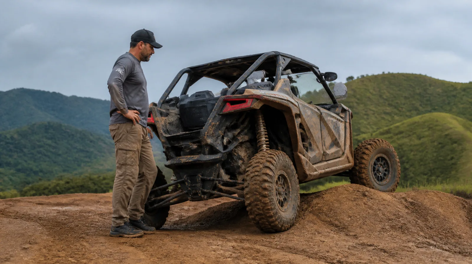 Pneu off-road em veículo 4x4 na trilha de terra com lama e pedras, em cena fotorrealista